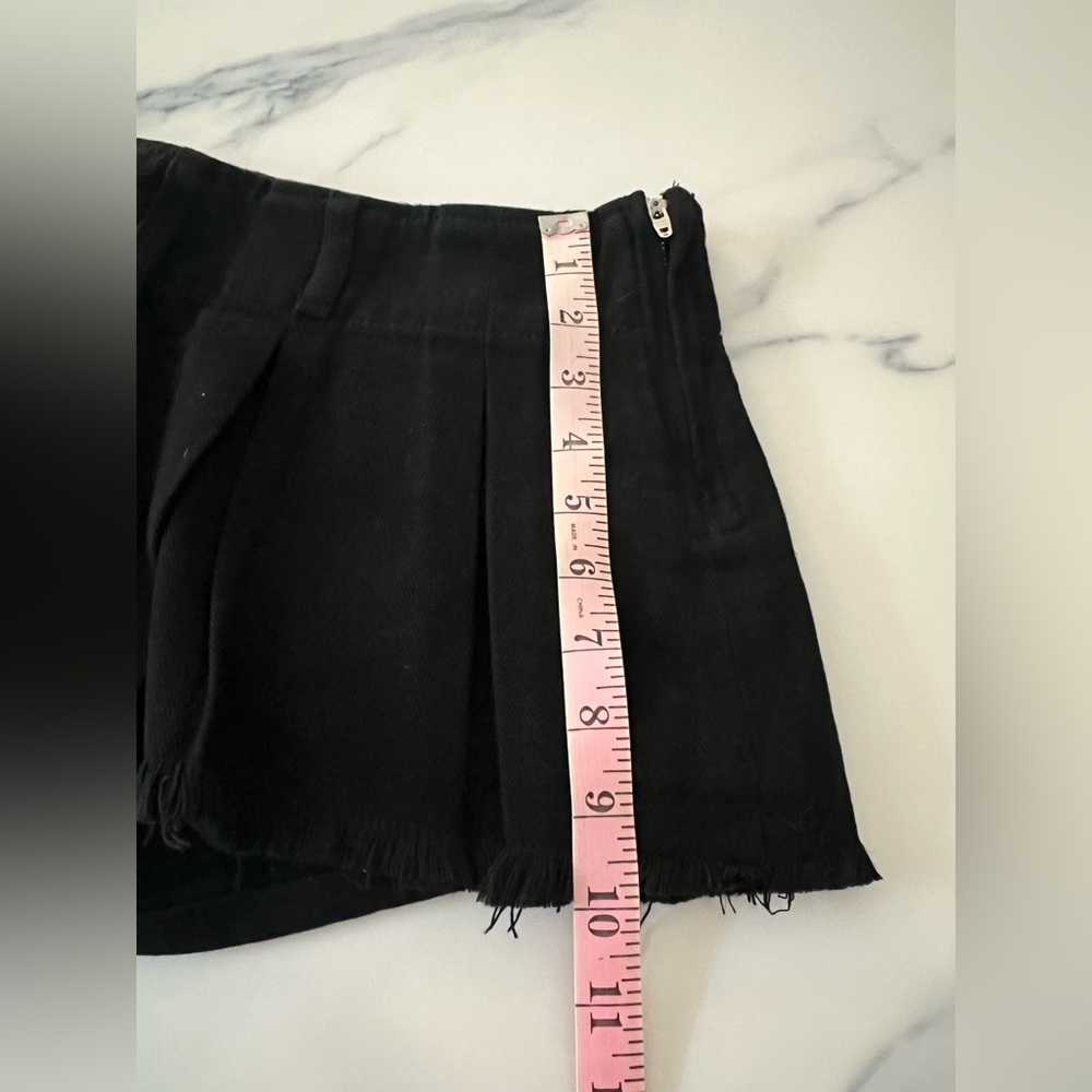 EDIKTED Low-Rise Pleated Cotton Denim Mini Skort - Picture 8 of 10